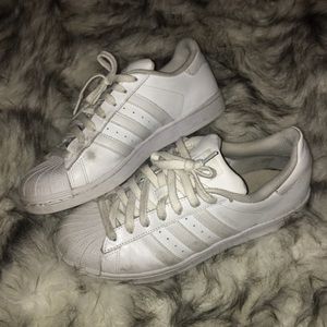 White Adidas Superstars